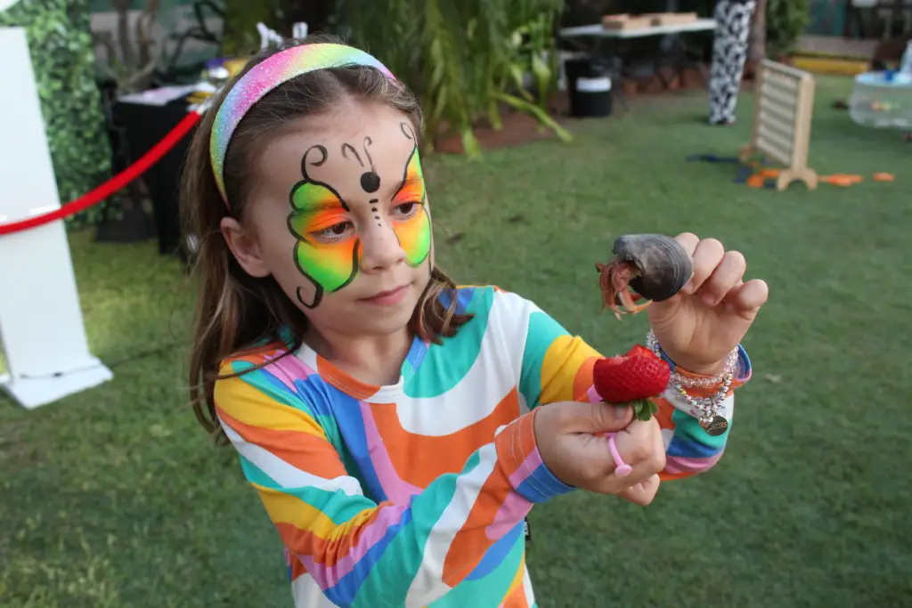 child with face paint on